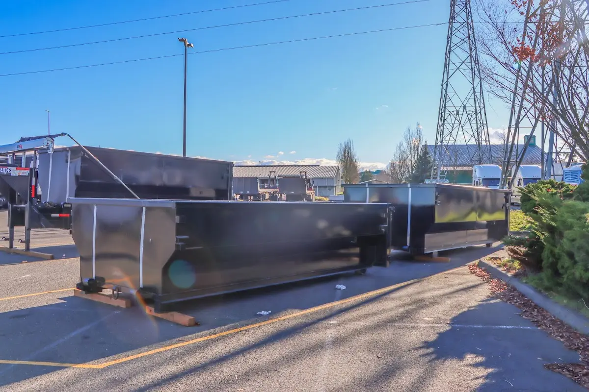 Roll-off dumpster ready for waste disposal at job site for 6 Yard Dumpster Rental in Newport
